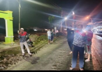 Dugaan Pengurukan Tanah Ilegal Yang Mengakibatkan Pengendara Alami Kecelakaan Di Jalan Raya Metatu